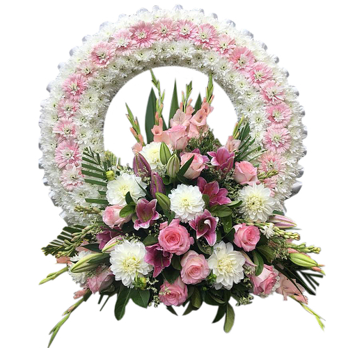 Pay tribute to the dearly departed with this pink arrangement of lilies, roses, chrysanthemums & snapdragon flowers. A divine display of love & compassion.
