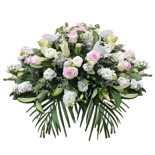 White stock flowers, roses & lilies complemented by pastel pink roses to match the angelic motif carried by this design to express your heartfelt love.
