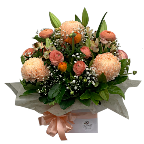 Magnificent chrysanthemums, bright reddish-yellow buttercup flowers, fragrant lilies & dainty baby's breath all dressed in brilliant colour of ripe pumpkins. Send the Colours of Fall arrangement with your thoughts & prayers to your recipient.