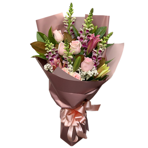 Featuring a premium range of pink flowers - silky roses, stargazer lilies, snapdragon & baby's breath. This luxurious combo will make anyone feel appreciated.