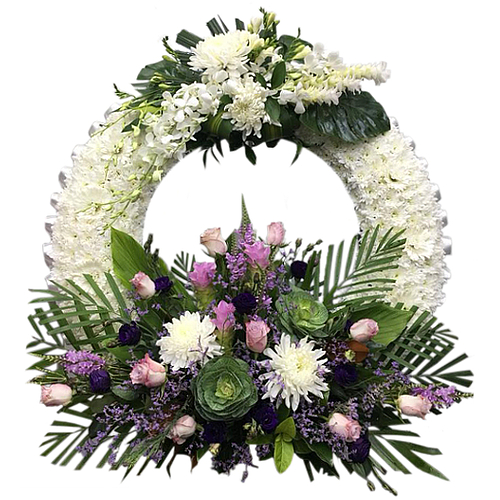 White ring of chrysanthemums daisies crowned with orchids accompanied by two-toned roses, lavender flowers & blooms. Suited to a service or funeral home.