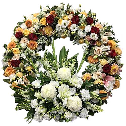This ring arrangement of flowers wears the colours red, brown, orange, yellow and white, carrying with it a warmth from a fire heart. A brilliant floral display.