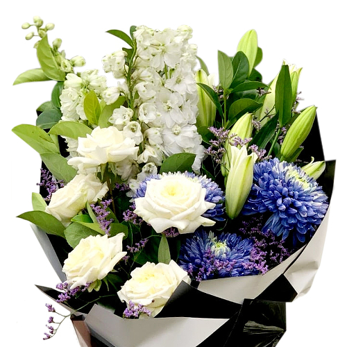 Blue flowers are rarity making these chrysanthemum bulbs ever more striking against the white of roses, lilies and stock flowers. Send this bouquet with a message of heartfelt wishes and hope.