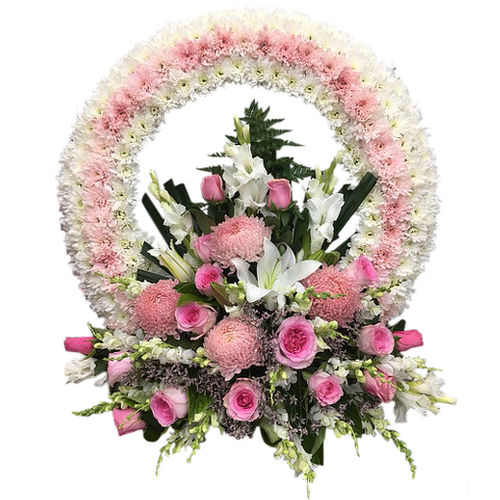 A ring of pink flowers arch over bountiful bundle of pink and white roses, lilies, snapdragon flowers & chrysanthemums. Thoughtfully displays your sentiments.