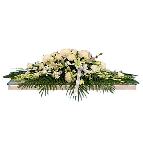 A wonderful display of elegance, purity and innocence. Features a deluxe variety of pure white flowers in full bloom. The funeral  coffin flower spray includes white roses, white oriental lilies and orchids.