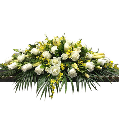 A blanket of pure white roses and lilies with cherished scent that create a magnificent final tribute, sincerely expressing devotion and love.