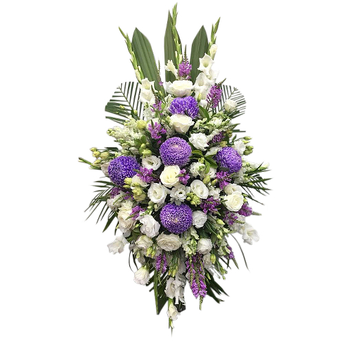 Arrangement that encompasses all qualities of the colour purple - extravagance, devotion, nobility & peace. Roses, gala lilies, china aster, lavender & more.