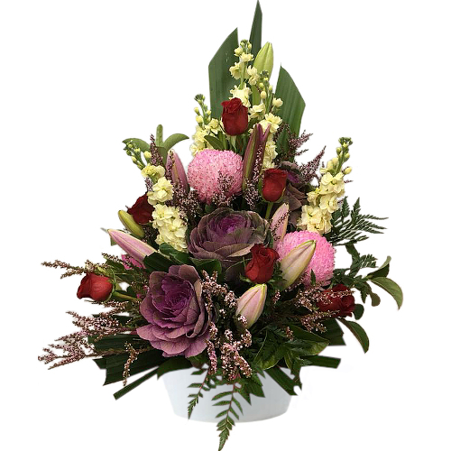 Spruce up any space & add sophistication with our magnificent arrangement of  premium roses, chrysanthemum, brassica and stock blooms.