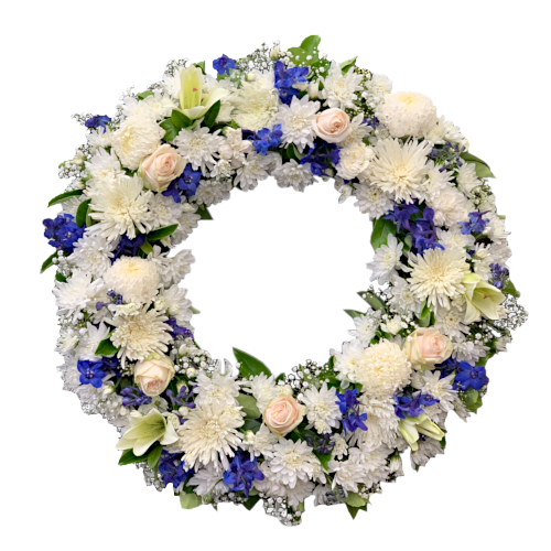 Remember a life lost too soon with a sympathy wreath featuring flowers in tones of white, peachy pink and blue. Colourful orchids tucked away amongst white roses and chrysanthemum clouds.