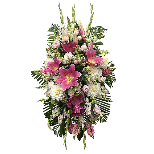 Pink stargazer lilies, roses and stockflowers standout against their white counterparts. Send this spray in loving memory of someone held dear to your heart.