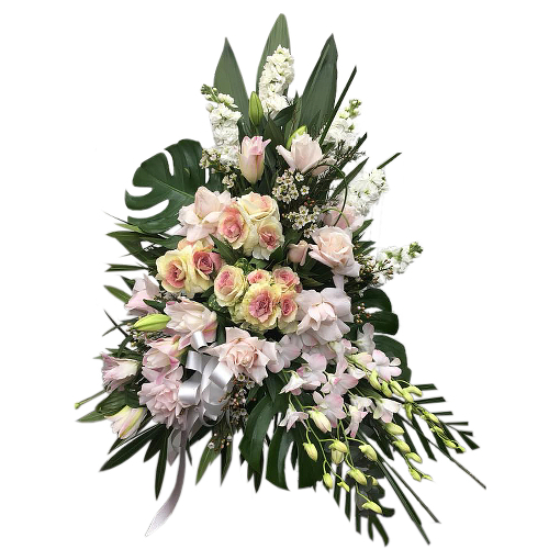 Send this thoughtful creation with the brightest and most pure message to someone special. The Whisper White spray is a waterfall of two tone roses, lilies, orchids and snapdragon flowers.